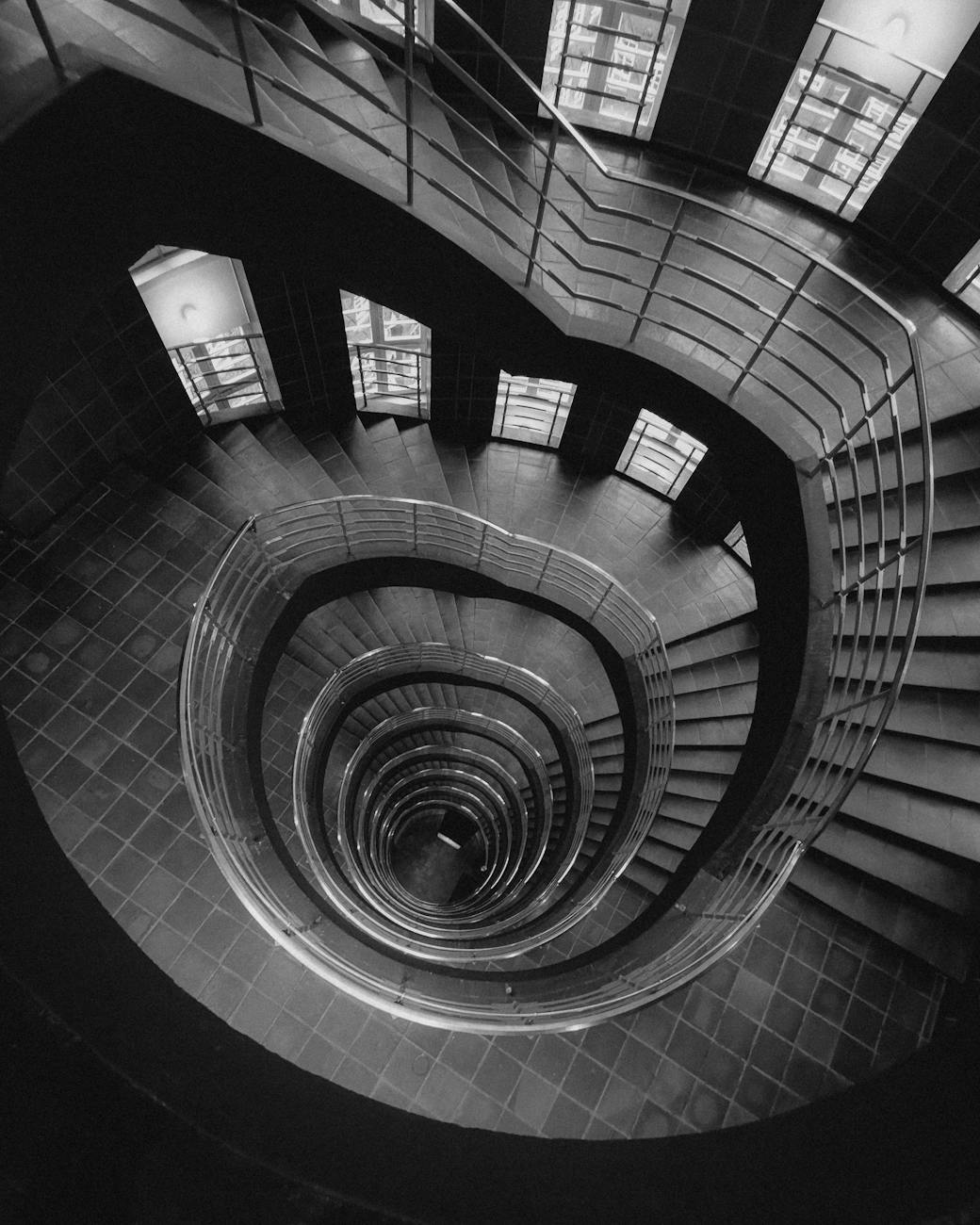 black and white spiral staircase vertical view